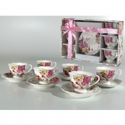et of 6 cup and saucer sets with flower design
